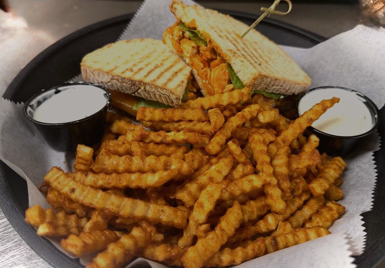 Panini sandwich and fries at Downtown Social